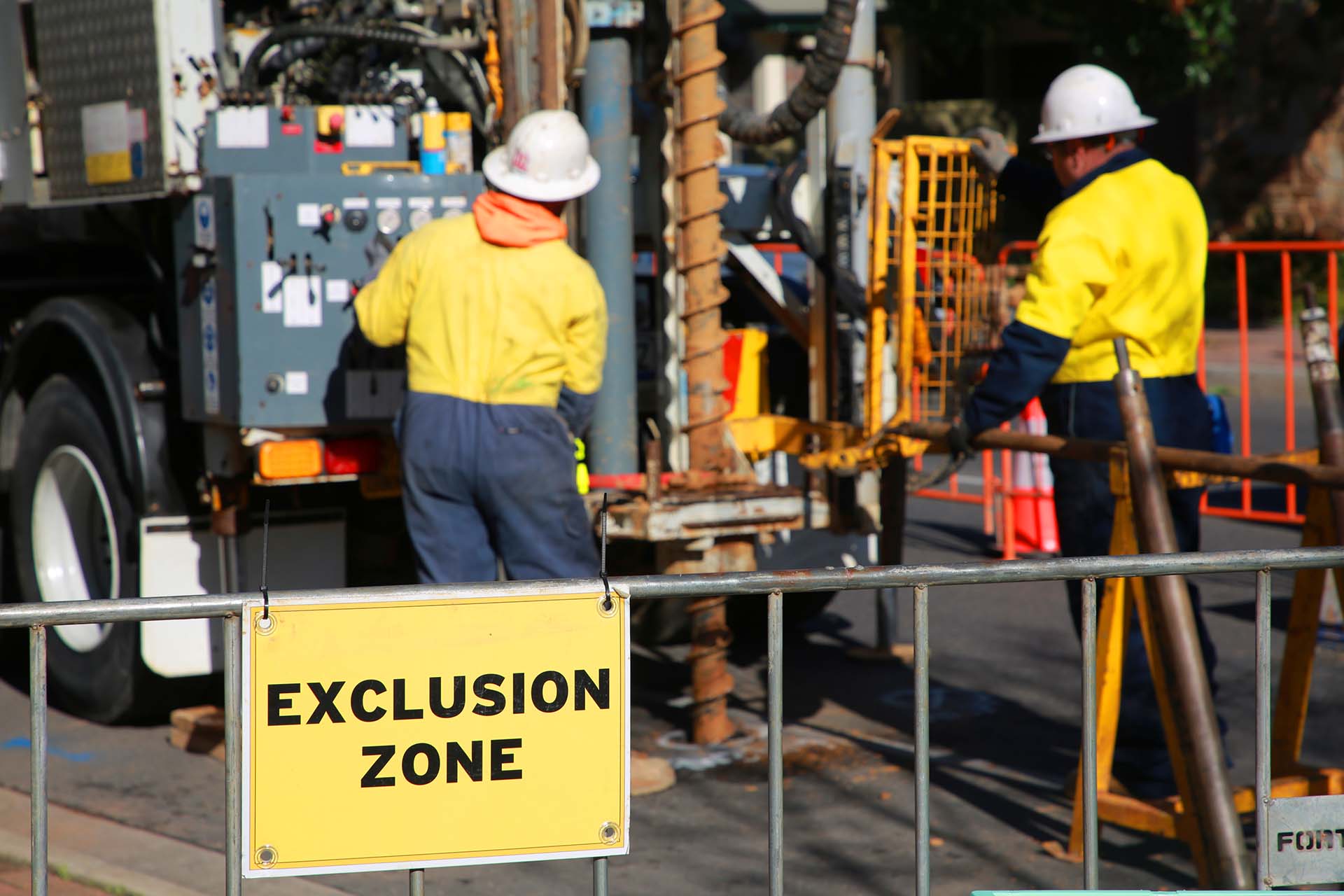 Exclusion zone as workers collect soil core samples